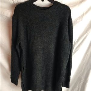 An oversized dark gray sweater